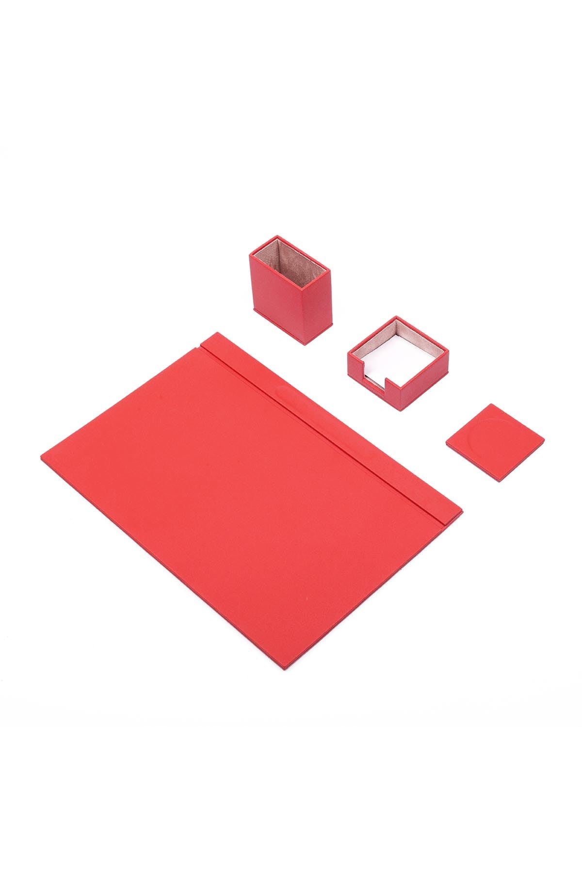 Luna 4-piece desk set in red with a fine matte texture: desk pad with top rail, pen cup, memo holder with notepaper and coaster