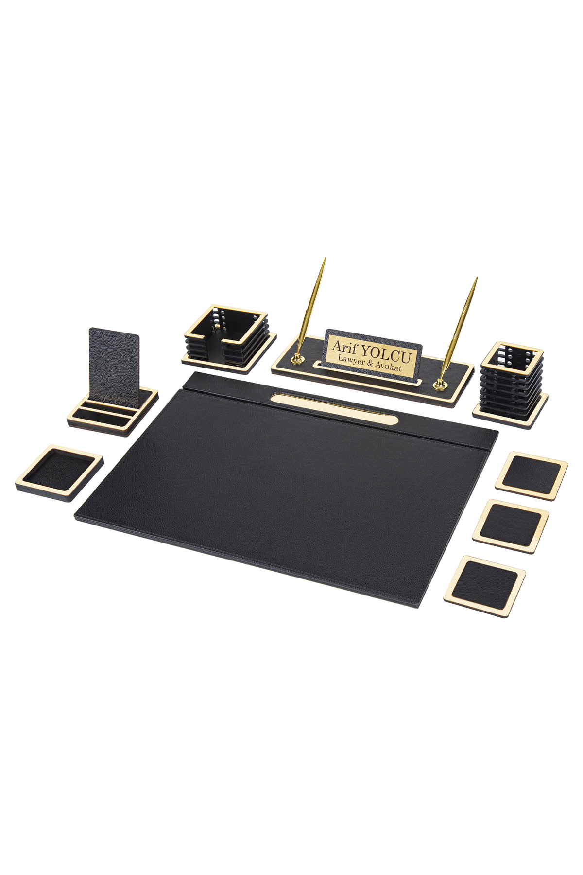 Vesta 12-piece desk set in black with gold-tone edge trim: desk pad, phone stand, memo holder, nameplate with two pens, pen cup and coasters