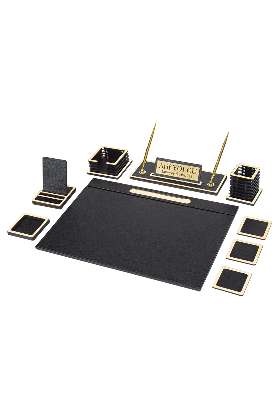 Vesta 12-piece desk set in black with gold-tone edge trim: desk pad, phone stand, memo holder, nameplate with two pens, pen cup and coasters
