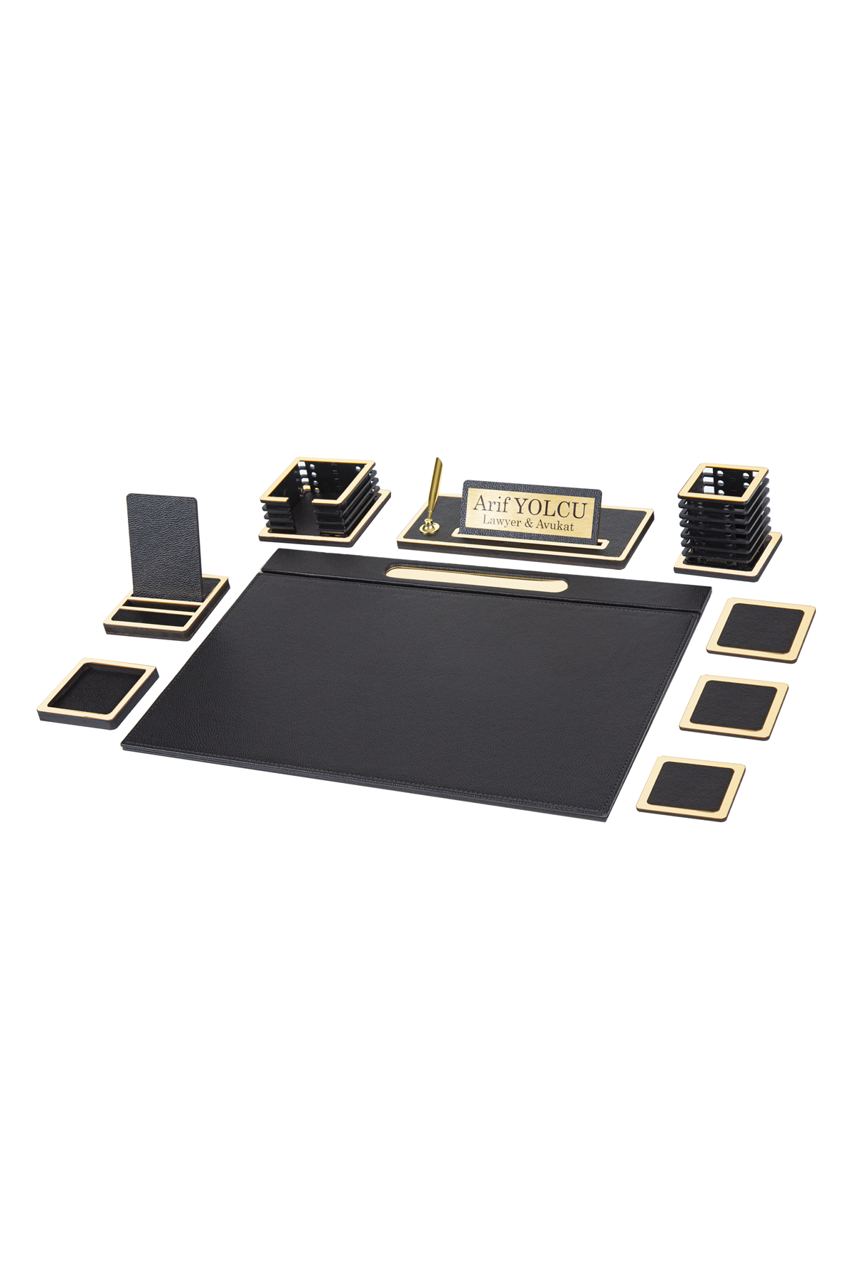 Vesta 11-piece desk set in black with gold-tone edge trim: desk pad, phone stand, memo holder, nameplate with sample text, pen cup and coasters