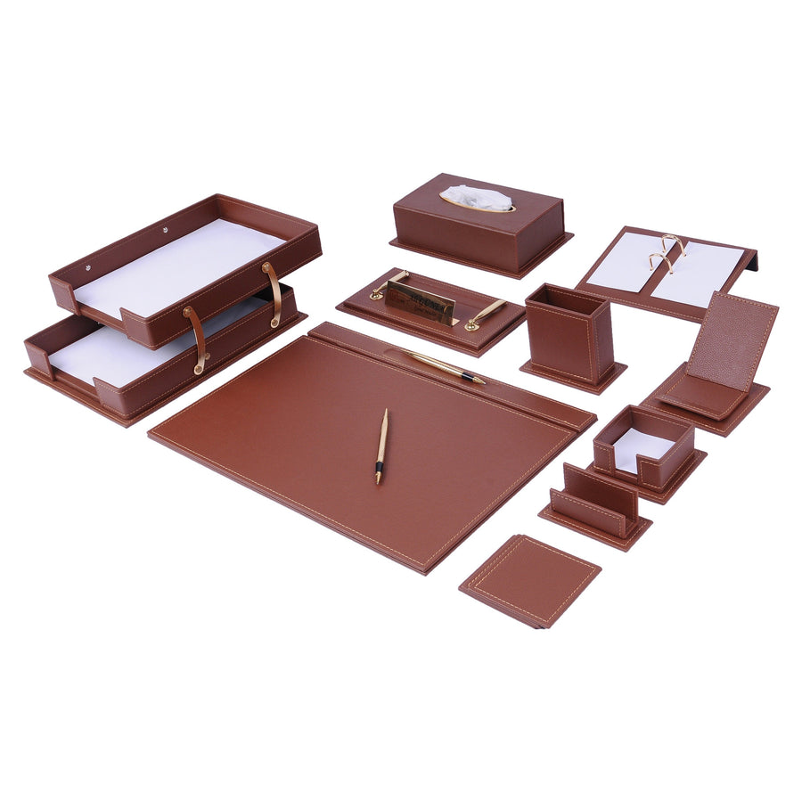 Vega 14-piece desk set in tan with light stitching and gold-tone accents: desk pad, two-tier tray, tissue holder, nameplate, calendar, pen cup